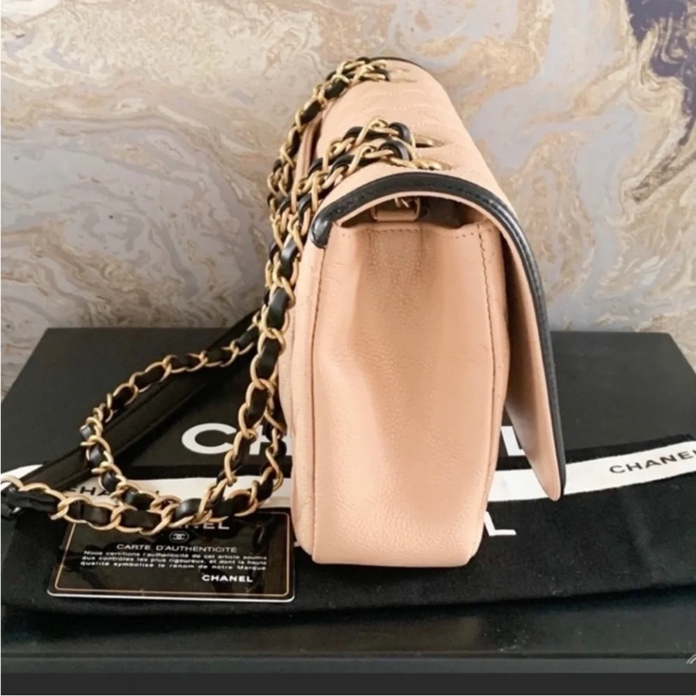 Authentic Chanel Medium Filagree Quilted Leather Bag